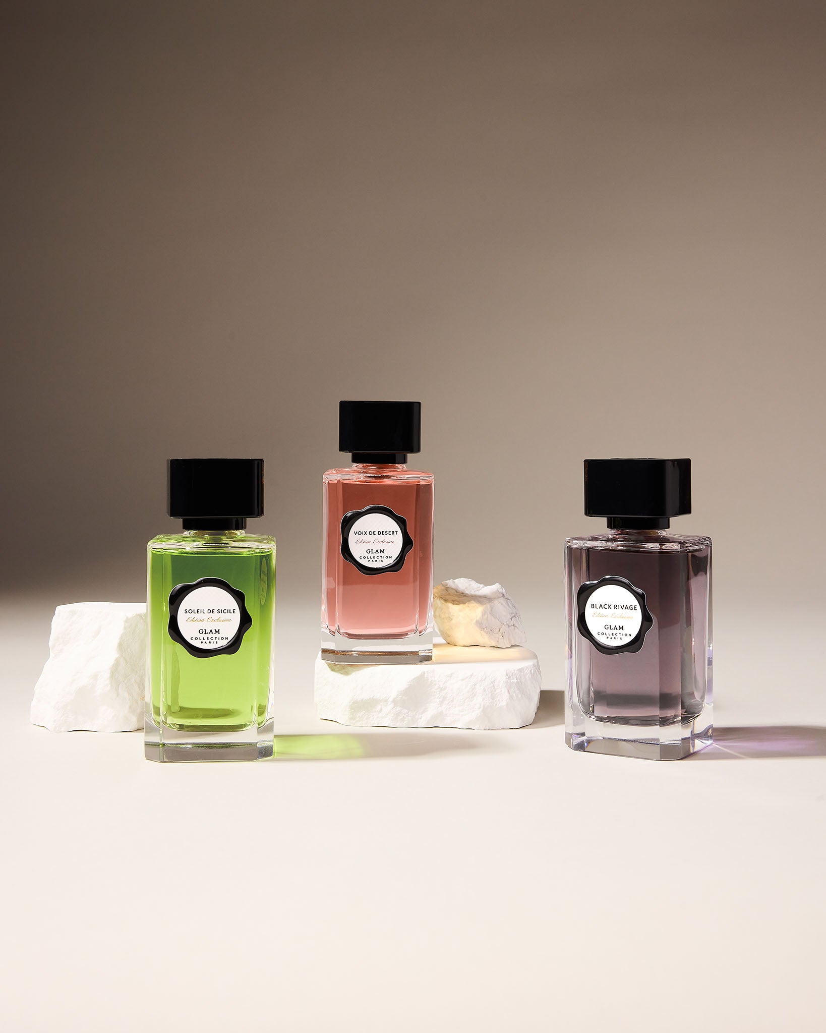 Trois flacon de parfum de Glam collection paris : voix de désert, black rivage, soleil  de cicile